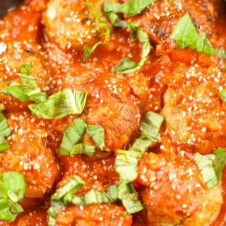 Turkey Meatballs With Tomato Sauce - these easy meatballs are baked and not fried. Served with a homemade light tomato sauce. The perfect 30 minute meal.